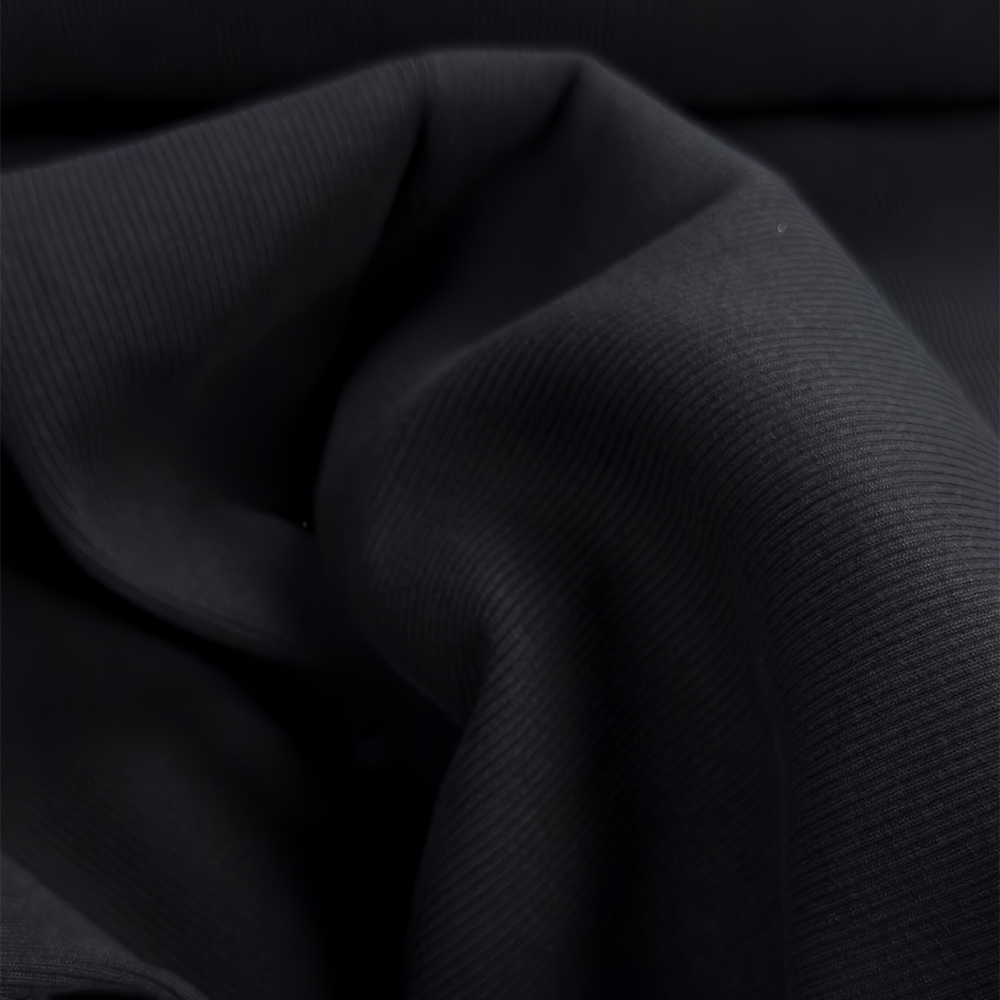 Schwerer Rippbündchenstoff in Schwarz, 430 g/m², 95 % Baumwolle / 5 % Elasthan – elastisch, formstabil und hochwertig.