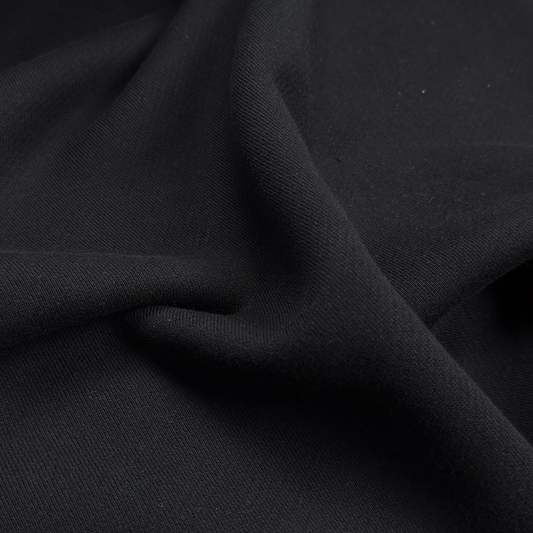 Detailaufnahme des schwarzen 475 g/m² Premium Sweatstoffs für das Sweatshirt DIY Kit.